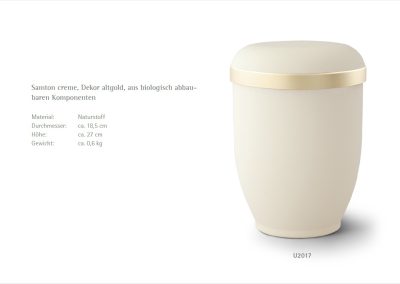 Diese beige, biologisch abbaubare Urne, perfekt f&uuml;r eine w&uuml;rdevolle Bestattung, verf&uuml;gt &uuml;ber ein goldenes Band und ist detailliert mit genauen Ma&szlig;- und Materialangaben.