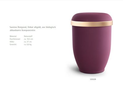 Lila Urne mit goldenem Band, gefertigt aus biologisch abbaubaren Materialien f&uuml;r eine umweltfreundliche Bestattung. Ma&szlig;e und Gewicht siehe links.